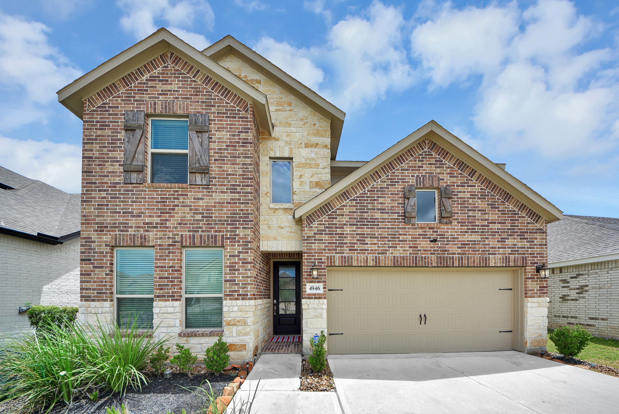 Front exterior of 4946 Sky Bluff Dr in Sunterra Katy TX