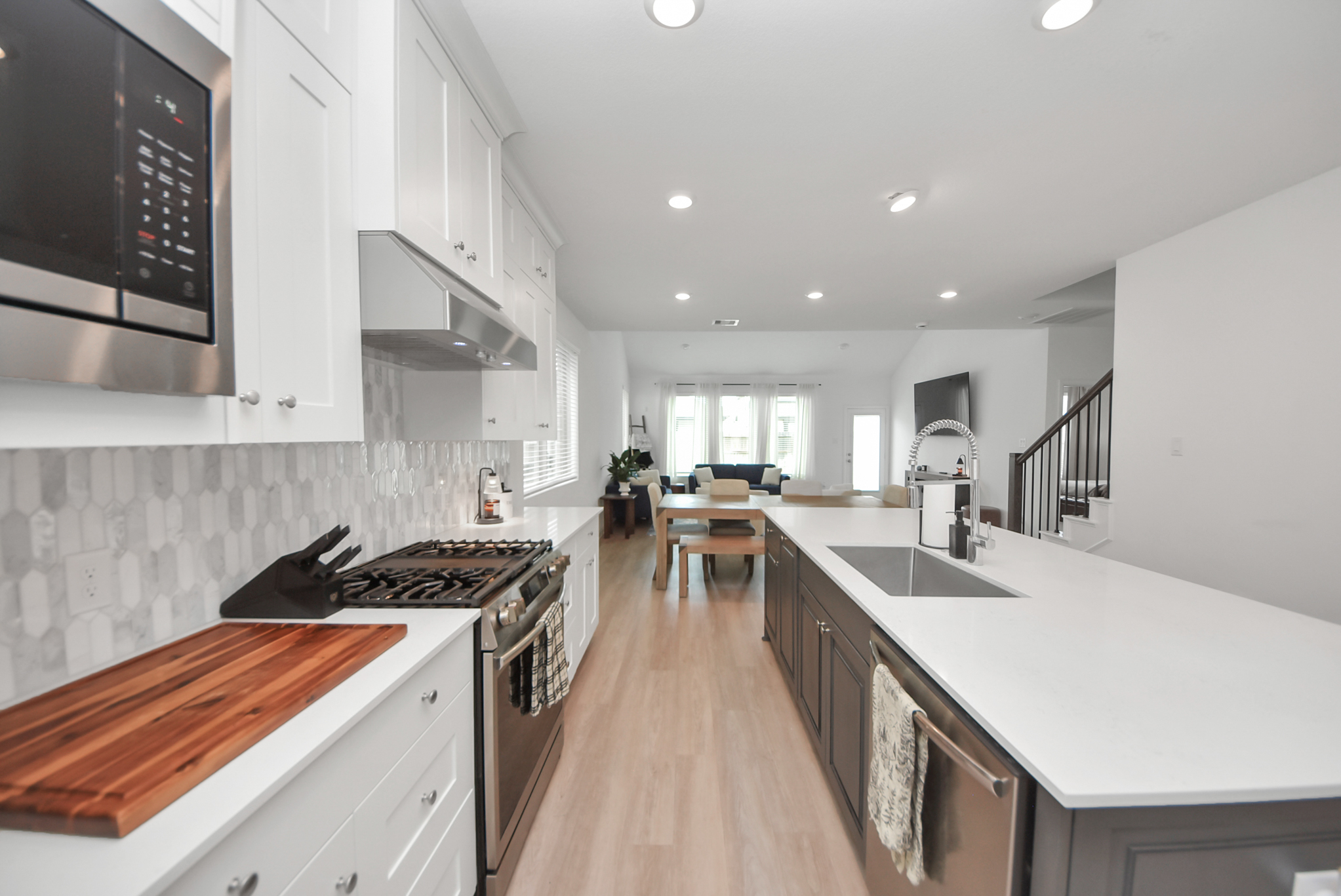 Kitchen island and stainless appliances