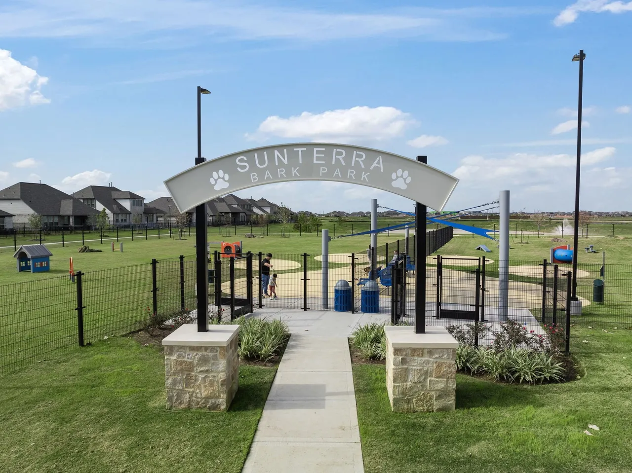 Sunterra Bark Park entrance for pet-friendly living